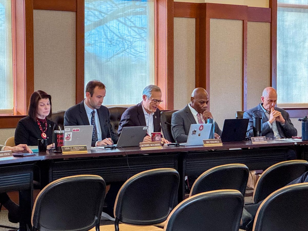 The Board of Trustees sit at its meeting Thursday. The NIU Board of Trustees met Thursday and addressed concerns over a projected $1.9 million budget deficit the university expects to face within the fiscal year. (Grace Kilbreath | Northern Star)