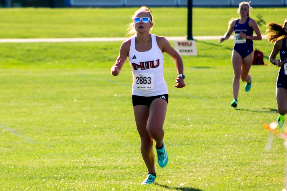 NIU cross country freshman Claire Helmila passes the 3k mark while competing in the Huskie Classic on Sept. 5. Helmila was one of three Huskies who raced in the NCAA Midwest Regional on Friday. (Northern Star file photo)