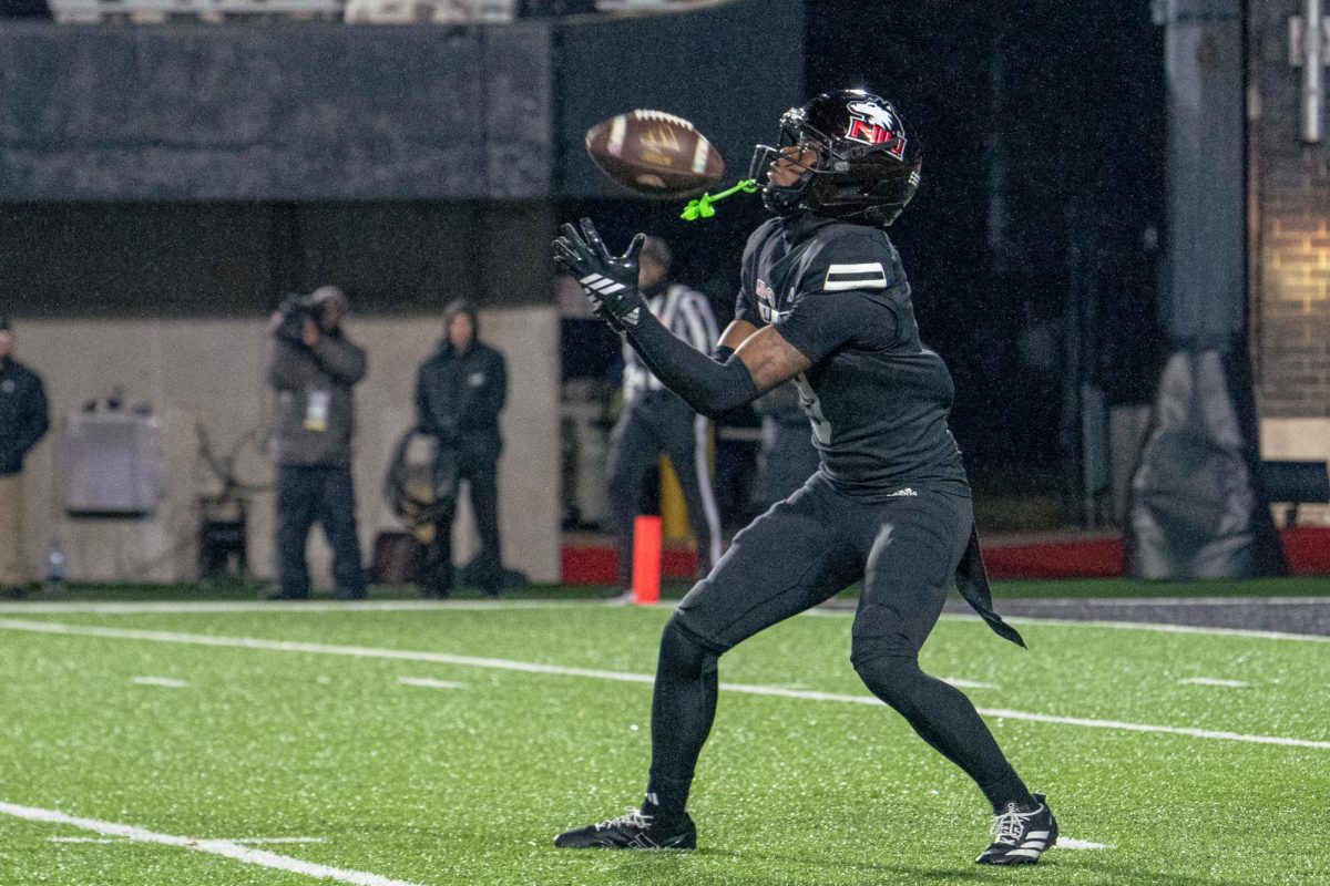 NIU football freshman cornerback  Dev’ion Reynolds receives a kickoff during the second quarter of NIU’s game against Western Michigan University on Nov. 18. The Northern Star Sports staff shares their predictions for the outcomes of five college football games scheduled to take place this week. (Northern Star File Photo)