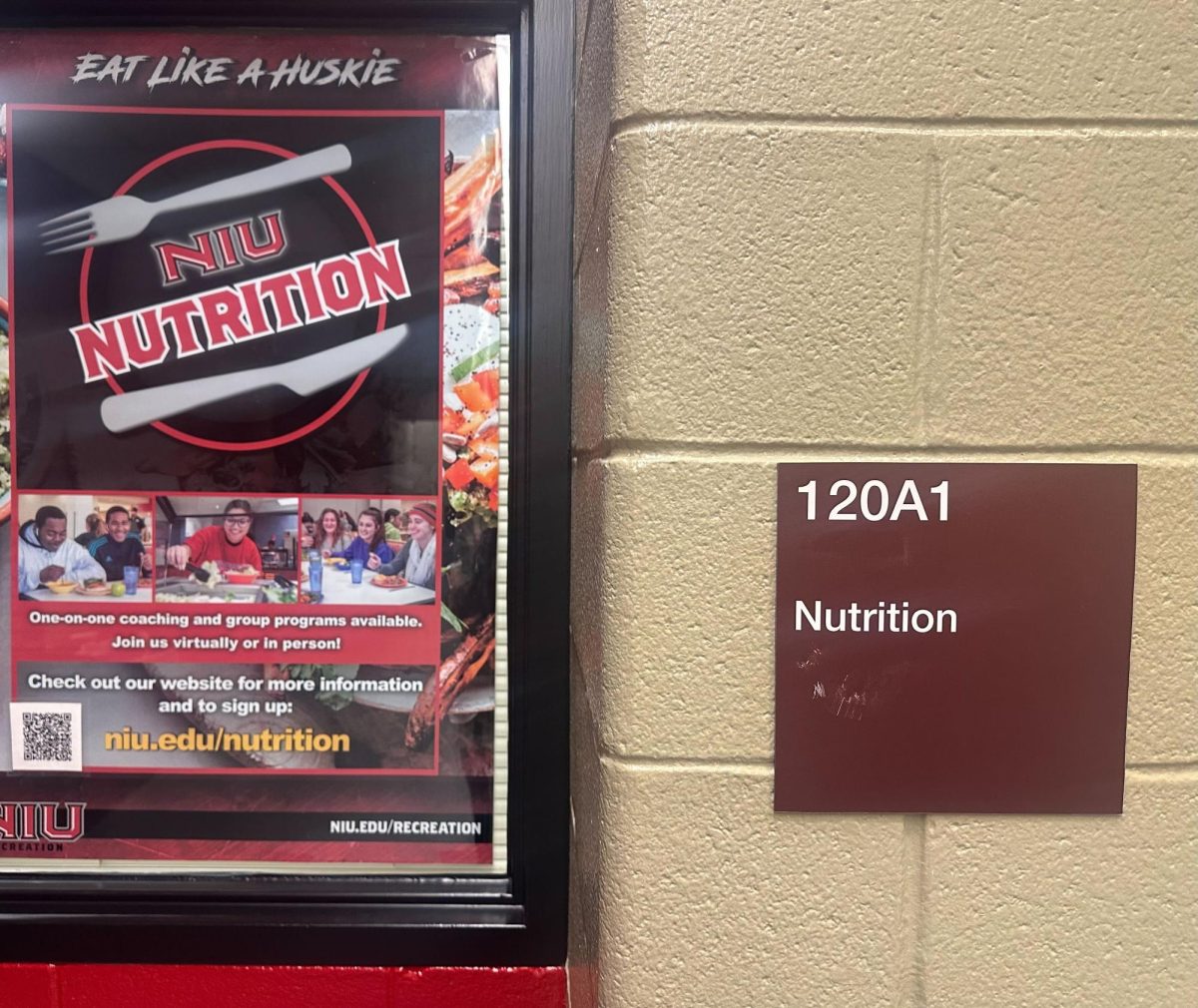 A sign for NIU Nutrition sits in front of Room 120 of the Recreation Center. Nutrition coaching is one of the many nutrition resources offered by NIU's Recreation Center. (Diego Martinez | Northern Star)