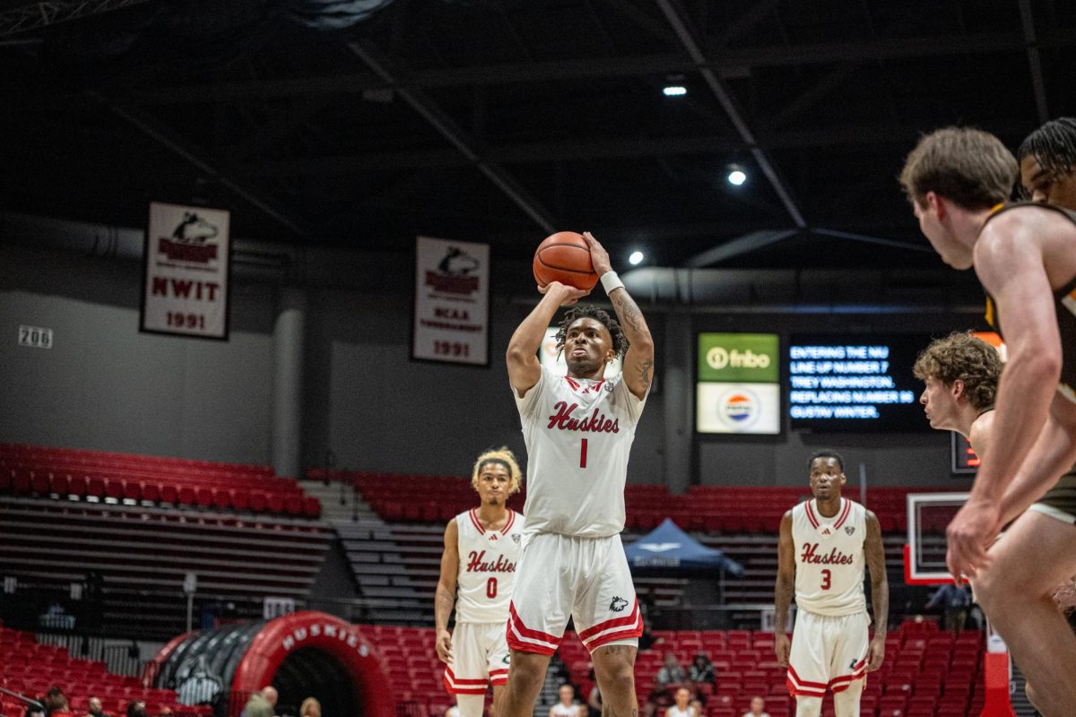 NIU sophomore guard Makhai Valentine (1) shoots a free throw during NIU’s exhibition game against Quincy University on Oct. 28. The Huskies fell at home to Lindenwood University in a 99-64 loss on Tuesday. (Totus Tuus Keely | Northern Star) 