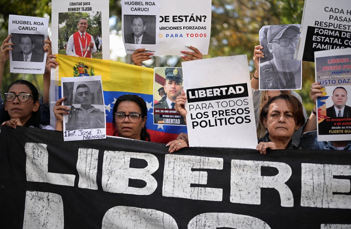 Demonstrators gather outside the Attorney General's office in Caracas, Venezuela, last Tuesday holding posters with pictures of detained people while demanding their liberation, amid prisoner releases by the Venezuelan government following the U.S. capture of Nicolas Maduro. Opinion columnist Santiago Montañez Bertoletti believes while President Maduro's arrest was a step towards liberation, without further action Venezuela will simply fall into another dictatorial regime. (REUTERS | Gaby Oraa)