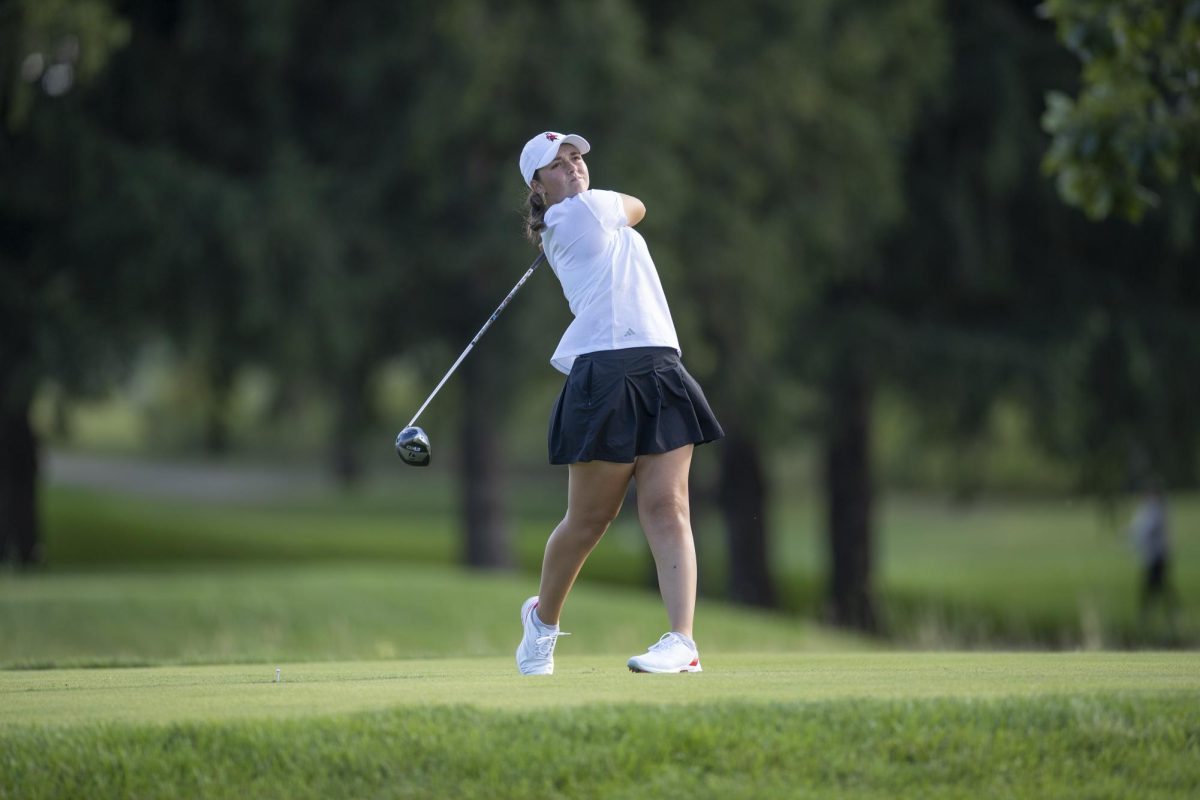 NIU women’s golf sophomore Alexa Ouellet follows through a shot during practice at Rich Harvest Farms. The Huskies competed at the UCF Challenge to open their spring season, coming in 15th place. (Courtesy of NIU Athletics)