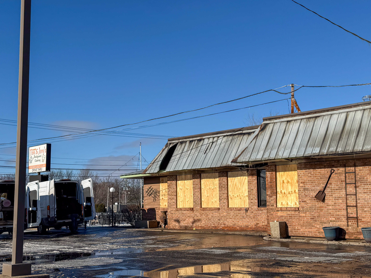 A closed off Tom and Jerry’s sits on a clear day. A longtime staple of the DeKalb community, Tom and Jerry’s restaurant, 1670 DeKalb Ave., was damaged by a fire early Saturday morning. (Grace Kilbreath | Northern Star)