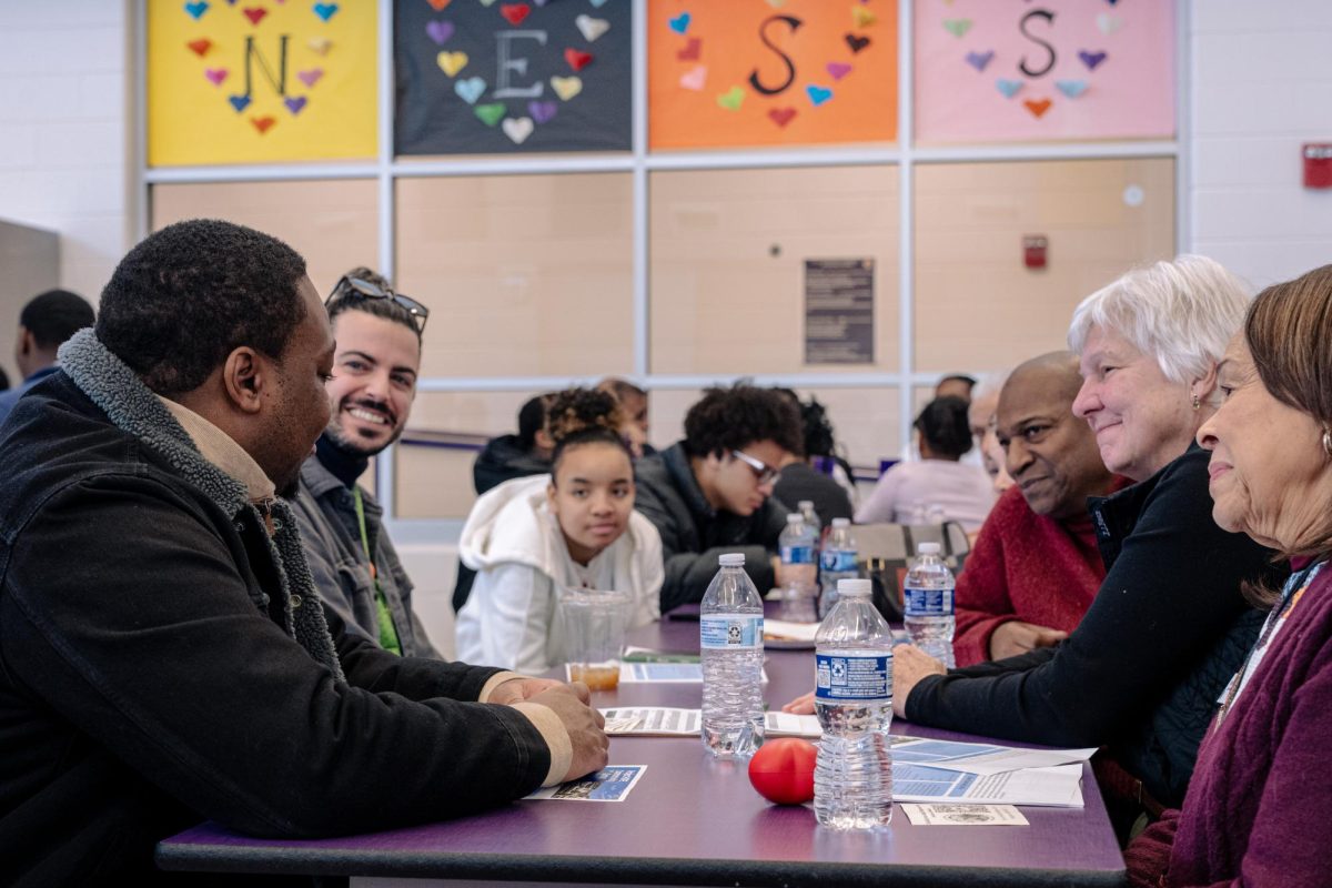 Attendees at the New Hope Missionary Baptist Church’s Beloved Community Town Hall discuss what is needed to ensure equitable opportunities for everyone in the community on Monday in the Dr. Leroy A. Mitchell Elementary School, 1240 Normal Road. New Hope held a community town hall at 1 p.m. on Martin Luther King Jr. Day to discuss ways to improve the community as well as current projects such as Rooted in Good and Project H.O.P.E. (Totus Tuus Keely | Northern Star)