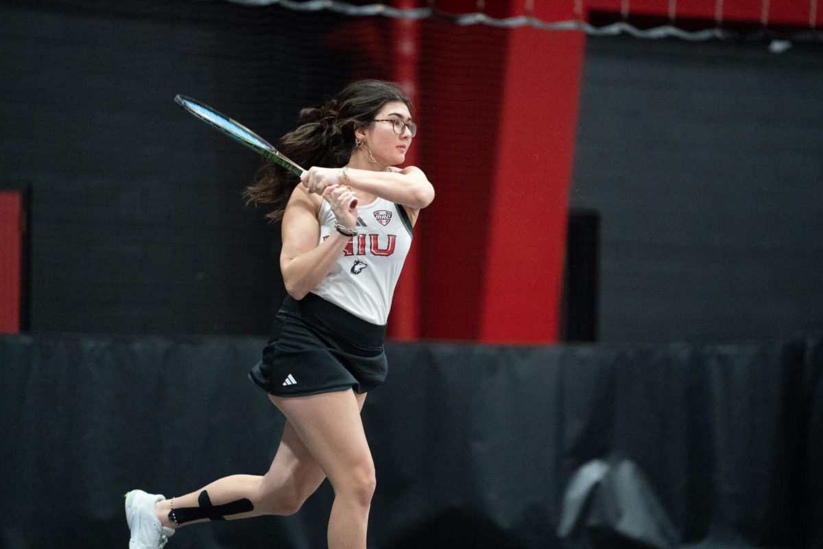  NIU women’s tennis sophomore Irmak Budak returns a serve during her match against Butler University senior Chase Metcalf. Budak won her match at No.1 singles to secure a 5-2 victory for the Huskies, their fifth straight. (Eric McGill | Northern Star)
