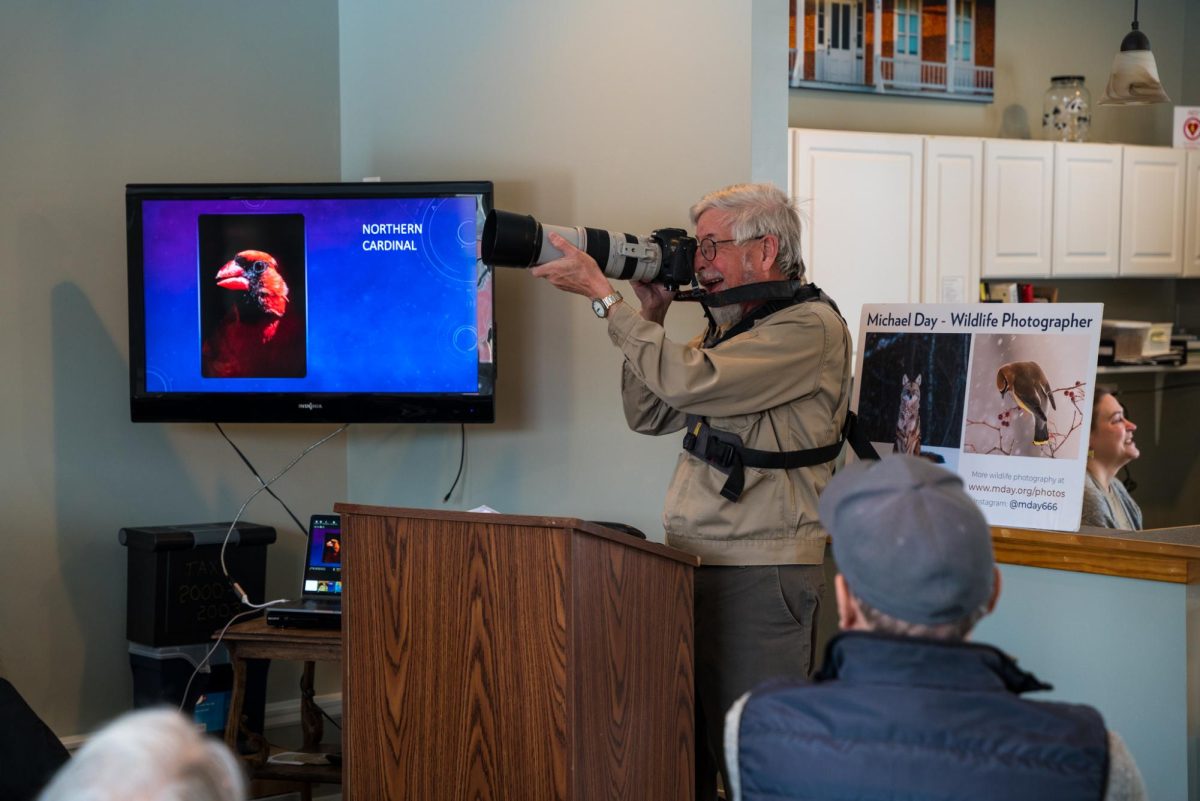 Local wildlife photographer Michael Day demonstrates how he takes photos to a class on Sunday at the Historic Annie Glidden Homestead, 921 W. Lincoln Highway. The historic homestead will host an event every other Sunday until March 22. (Eric McGill | Northern Star)