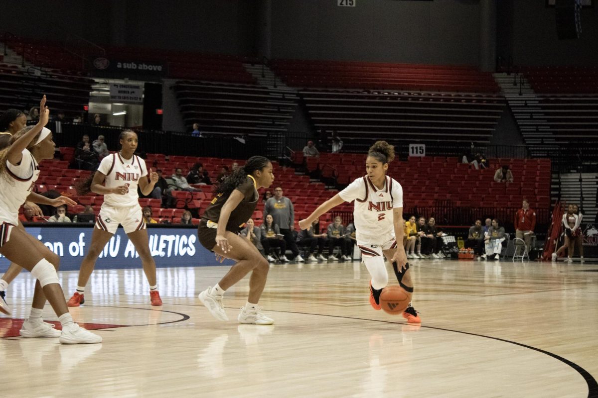NIU women’s basketball graduate student guard Nadechka Laccen (2) attempts to dribble past a defender during the Huskies’ game against Western Michigan University on Jan. 21. Laccen was NIU’s leading scorer with 11 points in a 71-43 loss to Miami University on Wednesday. (Ethan Rodriguez | Northern Star)
