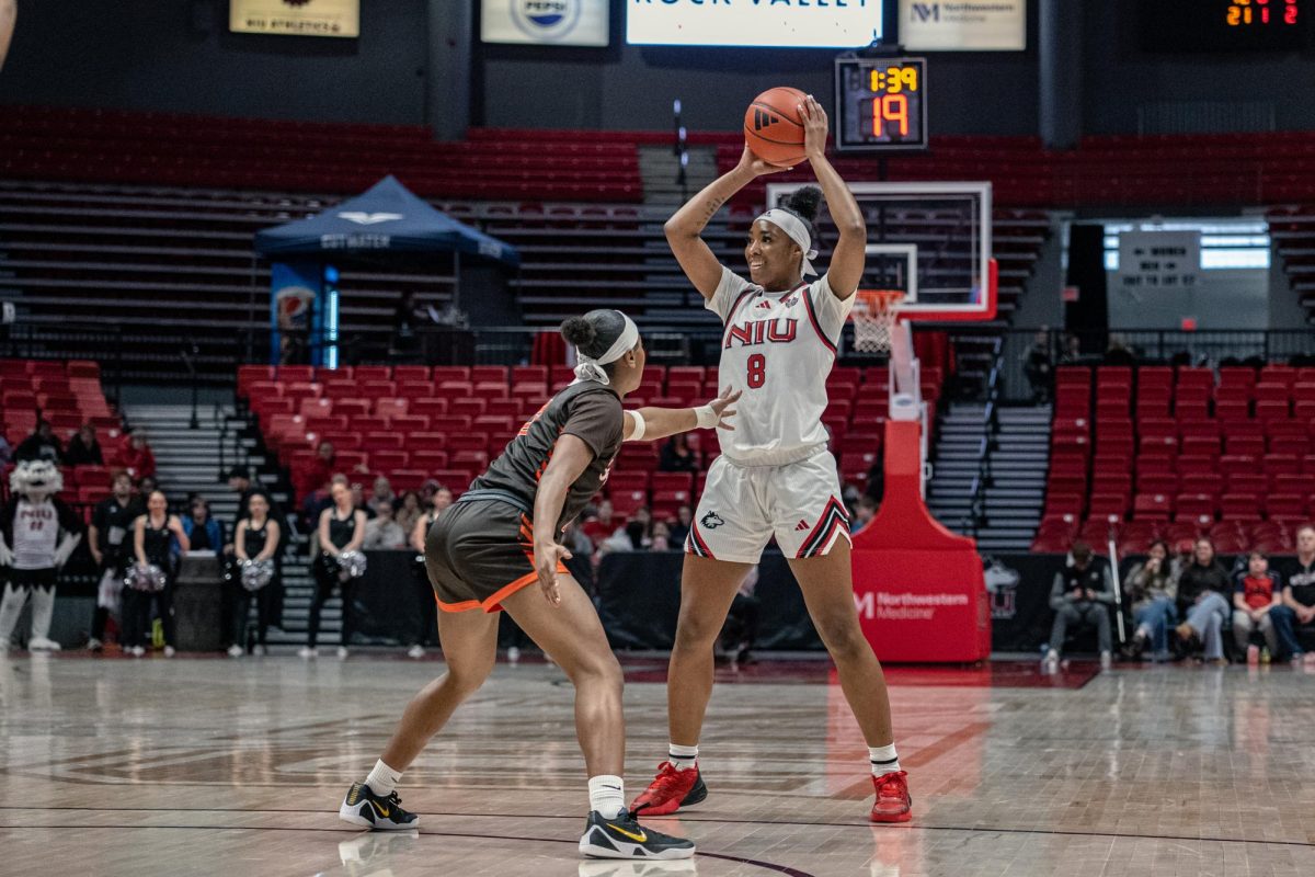 NIU women’s basketball junior forward Nevaeh Wingate (8) looks to pass the ball during the second quarter against  Bowling Green State University on Saturday in the Convocation Center. Wingate led the Huskies in scoring with 15 in a 70-49 loss to the University of Toledo on Wednesday. (Northern Star file photo)