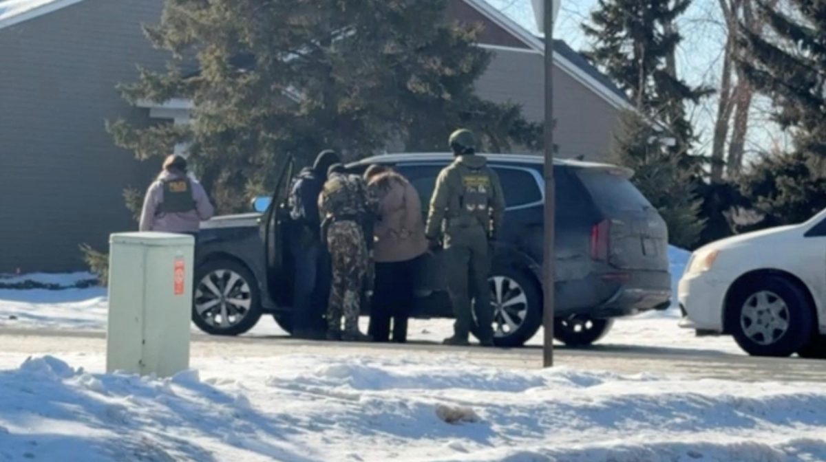 On Jan. 29, Rebecca Ringstrom is detained by federal immigration agents in Blaine, Minnesota. Opinion Columnist Santiago Montanez Bertoletti believes ICE is operating more like a paramilitary force rather than a law enforcement agency. (Collette Adkins | via REUTERS)