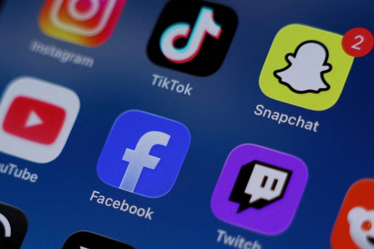 A picture taken Dec. 9 shows Instagram, TikTok, Snapchat, YouTube, Facebook, Twitch and Reddit applications displayed on a mobile phone. Opinion Columnist Adrian Maurer believes people should be less self-centered especially on social media. (REUTERS | Hollie Adams/Illustration)