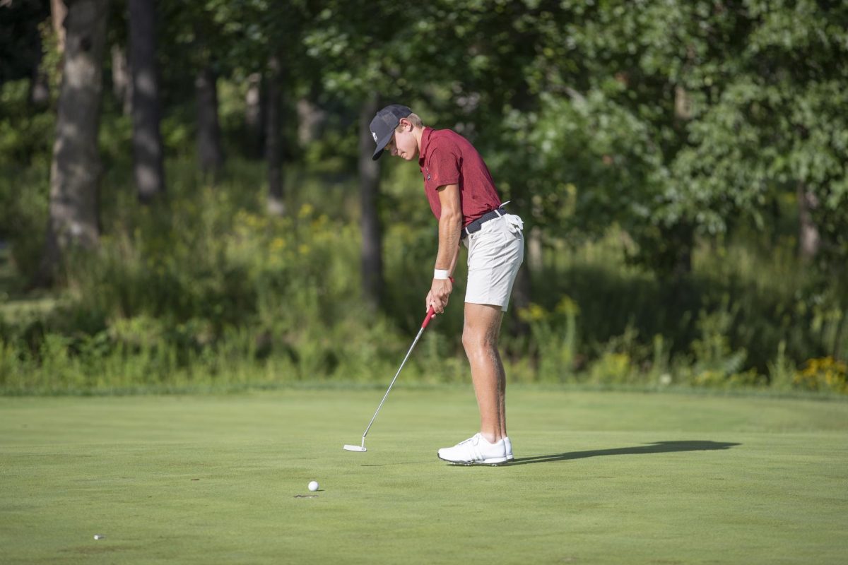 NIU men's golf sophomore Conner McCall prepares to putt at a practice Rich Harvest Farms. NIU tied for third place at the Lake Las Vegas Invitational. (Courtesy of NIU Athletics)