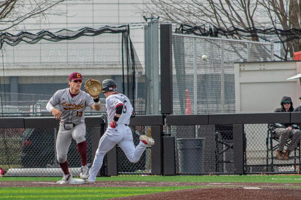 NIU sophomore shortstop Nolan Sandee (6) beats the throw to first base during the Huskies’ game against Central Michigan University on March 21. NIU earned its first season-opening series win since 2018 with a 6-5 win over North Carolina A&T State University on Monday. (Northern Star file photo)
