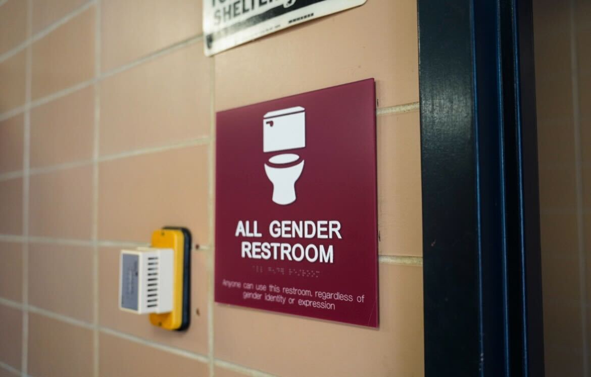 All Gender restroom signage is displayed in Gabel Hall.  Opinion Columnist Byrdie Seda believes more all-gender bathrooms should exist. (Ty McWilliams | Northern Star)