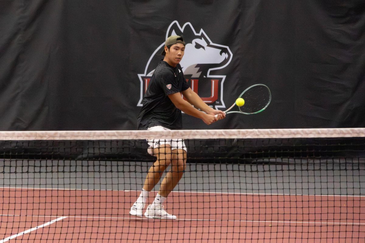 
NIU men’s tennis sophomore Chiao Bo Suo Nan prepares to hit the ball during his singles match against Southern University and A&M College junior Jaime Sigauque on Feb. 13. After dropping a 7-0 match to the University of Wisconsin-Madison on Saturday, the Huskies rebounded with a 4-0 sweep of Marquette University on Sunday. (Northern Star file photo)
