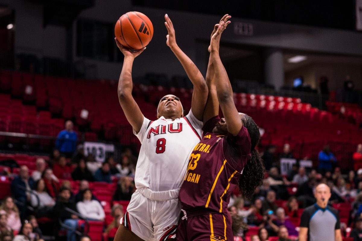 NIU women’s basketball junior forward Nevaeh Wingate (8) shoots a contested layup during NIU’s game against Central Michigan University on Saturday. Wingate was the Huskies’ leading scorer in NIU’s 83-48 loss to Ball State University on Wednesday. (Northern Star file photo)