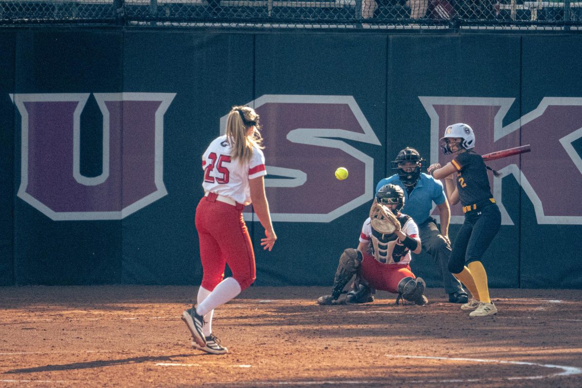 NIU softball graduate student pitcher Madison Carlson (25) delivers a pitch during NIU’s game against Triton College on Sept. 12. The Huskies took a 10-5 win over Bradley University to round out competition at the Blues City Invitational tournament on Sunday. (Totus Tuus Keely | Northern Star)

