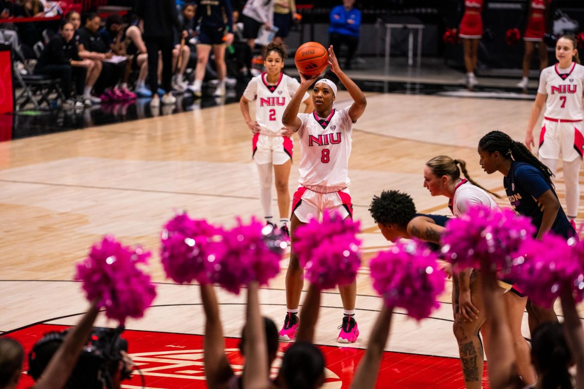 NIU women’s basketball junior forward Nevaeh Wingate (8) shoots a free throw against Akron University on Saturday in the Convocation Center. The Huskies suffered a 75-68 defeat at the hands of the Zips, moving to 2-11 in the Mid-American Conference. (Eric McGill | Northern Star)