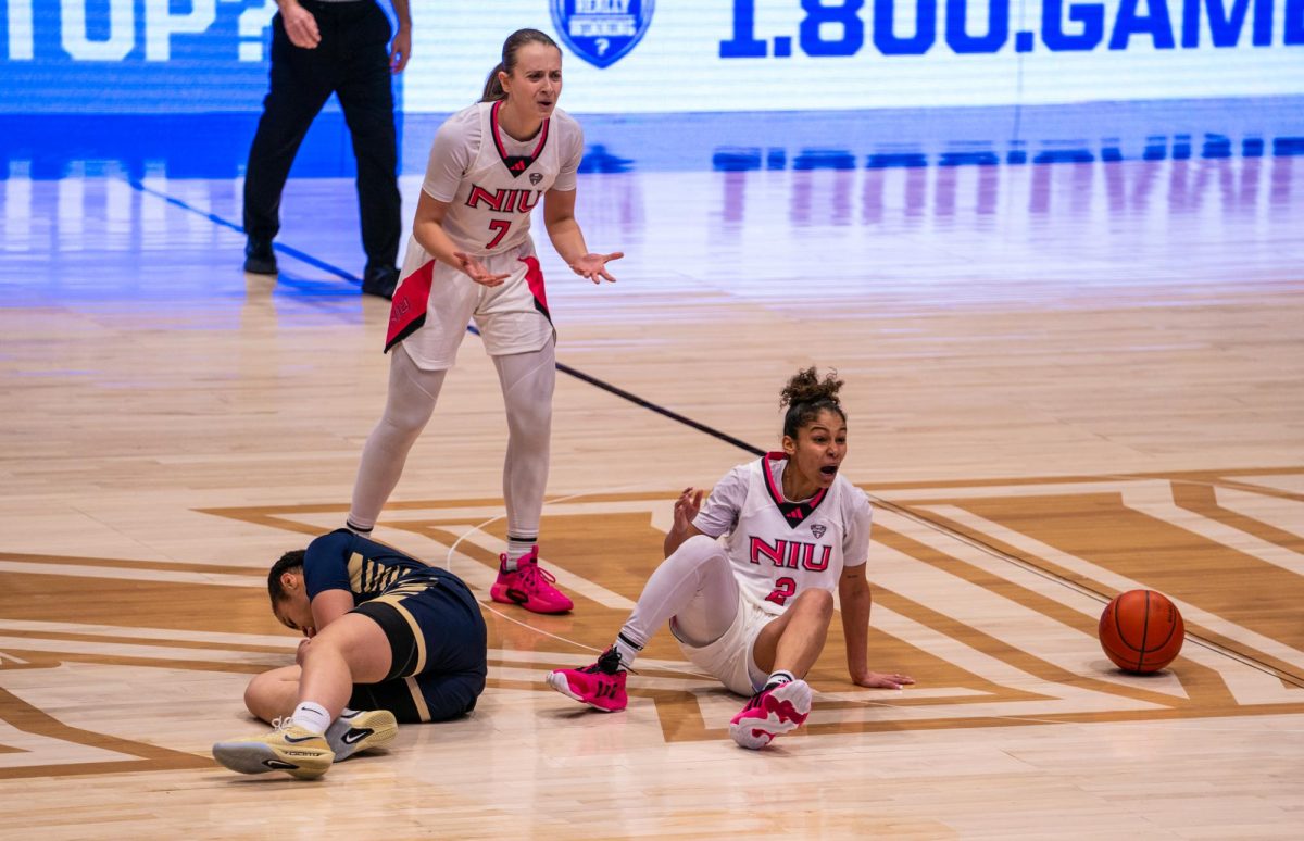 NIU women’s basketball graduate guard Nadechka Laccen (2) and senior guard Maria Serracanta (7) plead with the referee after a foul call against Akron University on Feb. 14. The Huskies’ comeback against Western Michigan University fell short as NIU dropped a 65-60 game against the Broncos on Saturday. (Northern Star file photo)