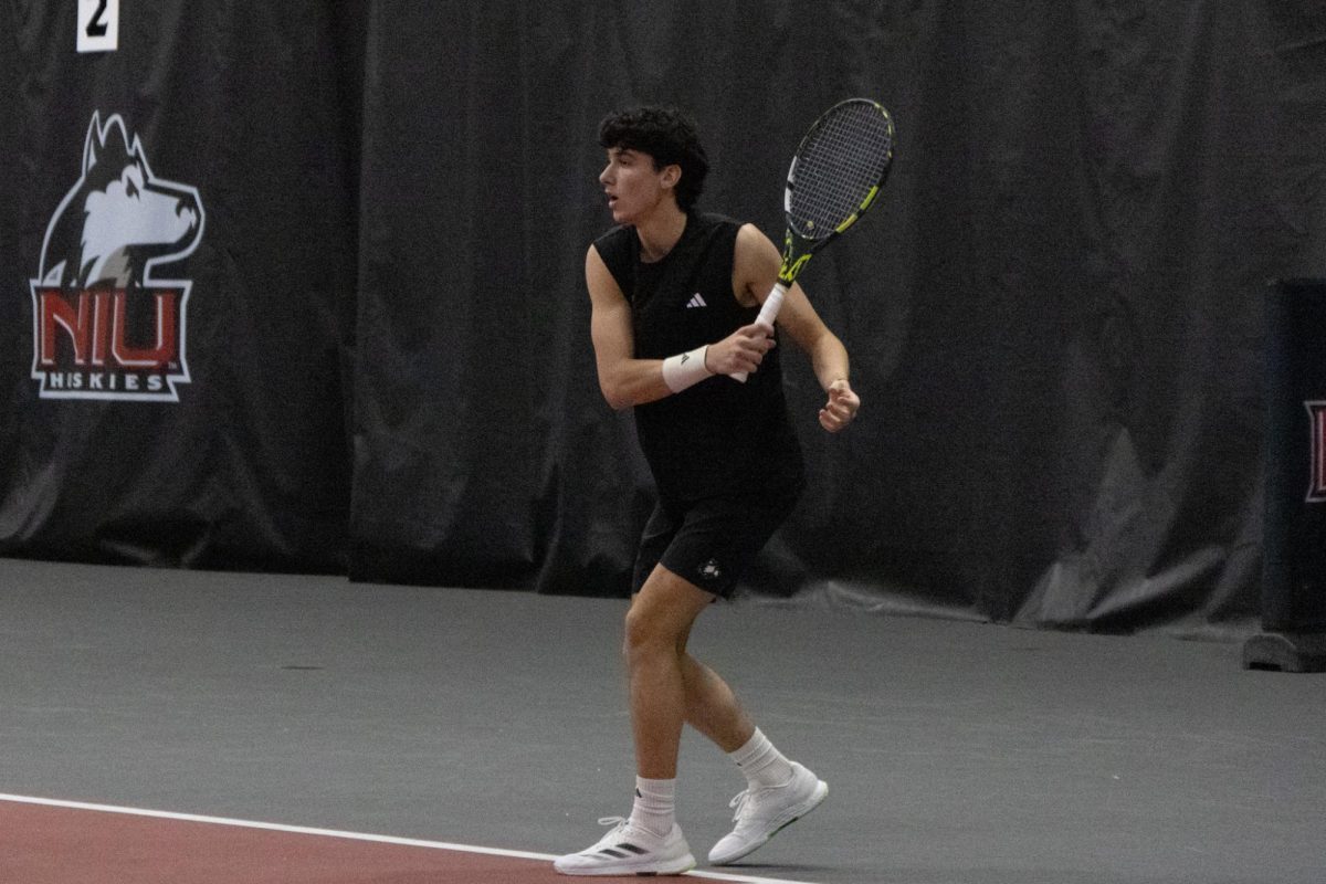 NIU men’s tennis senior Iker Gaztambide Arrastia follows through on his swing during the match against Xavier University on Jan. 31. Gaztambide Arrastia was named the Mid-American Conference Singles Player of the Week for the third time this season on Monday. (Northern Star file photo)