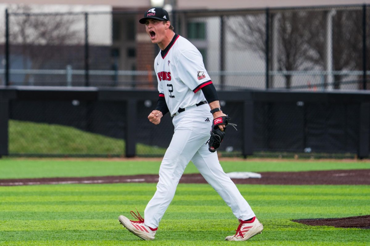 NIU baseball senior pitcher Matt Tarr screams at the dugout after striking out the final hitter against Bowling Green State University on Sunday at Ralph McKinzie Field at Walt and Janice Owens Park. The Huskies won the series finale 12-8, taking the series victory against the Falcons. (Eric McGill | Northern Star)