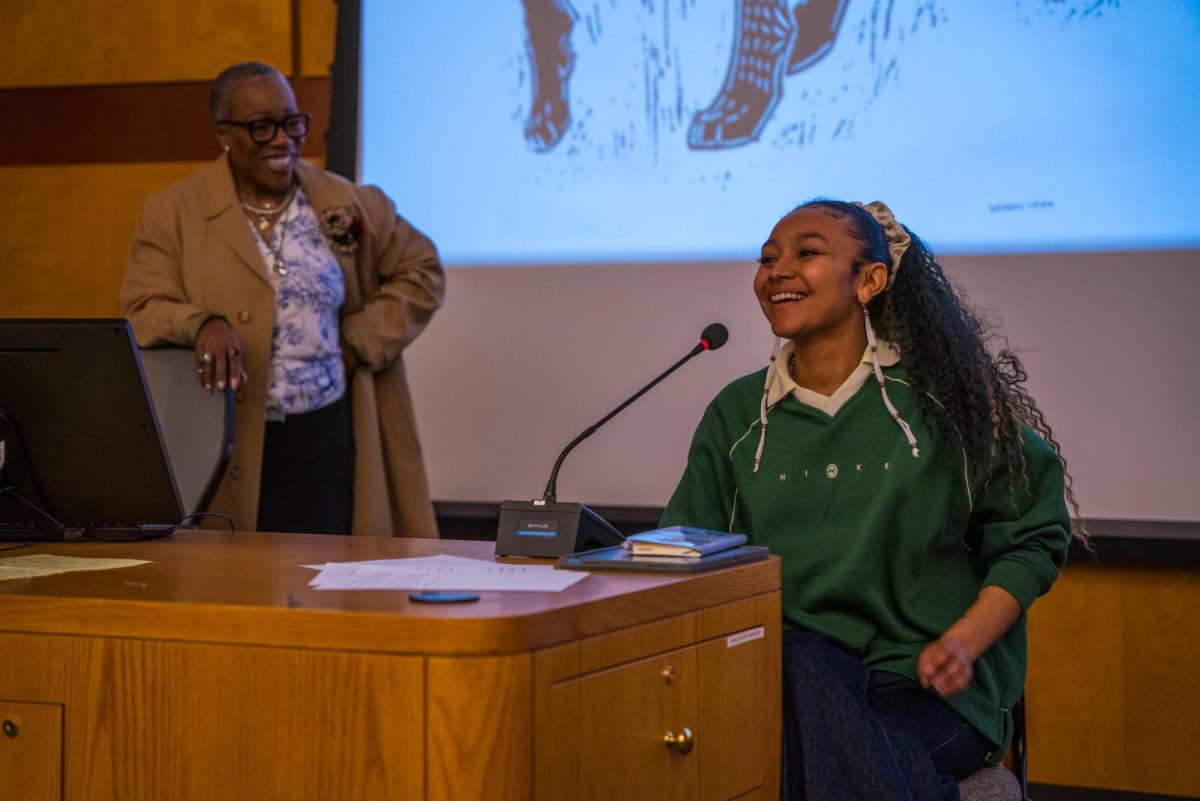 Artist Camille Billie (right) smiles as she answers a question from Carol A. Sumner, vice president for Diversity, Equity and Inclusion, during Billie’s Artist Talk event on Wednesday inside Cole Hall. The event was hosted by the Department of Academic Diversity and Inclusion and ran for 1.5 hours. (Eric McGill | Northern Star)