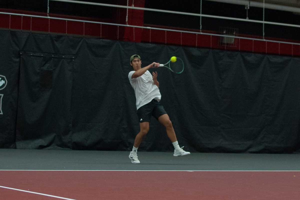 NIU men’s tennis sophomore Chiao Bo Suo Nan follows through a forehand groundstroke back to University of Wisconsin-Whitewater sophomore Keith Moeller in their singles match on Feb. 15. NIU took a 6-1 win over Chicago State University on Saturday, moving to 8-2 on the season. (Northern Star file photo)
