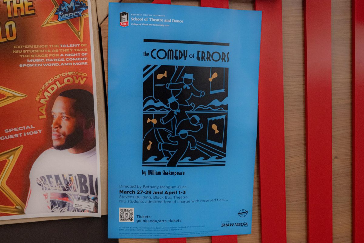 A poster for the NIU School of Theatre and Dance’s performance of “The Comedy of Errors” by William Shakespeare hangs on an event board in Holmes Student Center. The play will be showing from March 27 to March 29 and April 1 to April 3 at the Black Box Theater in Stevens Building. (Northern Star File Photo)