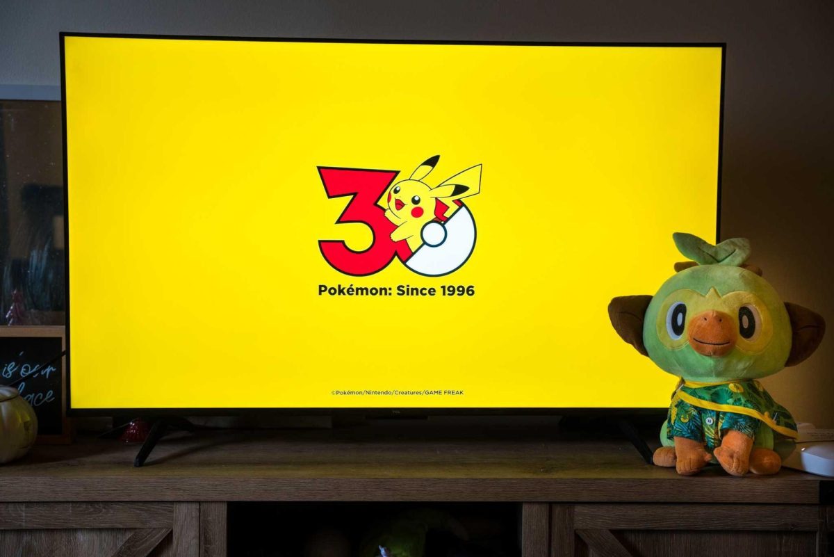 A TV displays the Pokémon 30th anniversary logo. Nintendo announced the three new first partner Pokémon are Browt, Pombon and Gecqua on Pokémon Day. (Eric McGill | Northern Star)