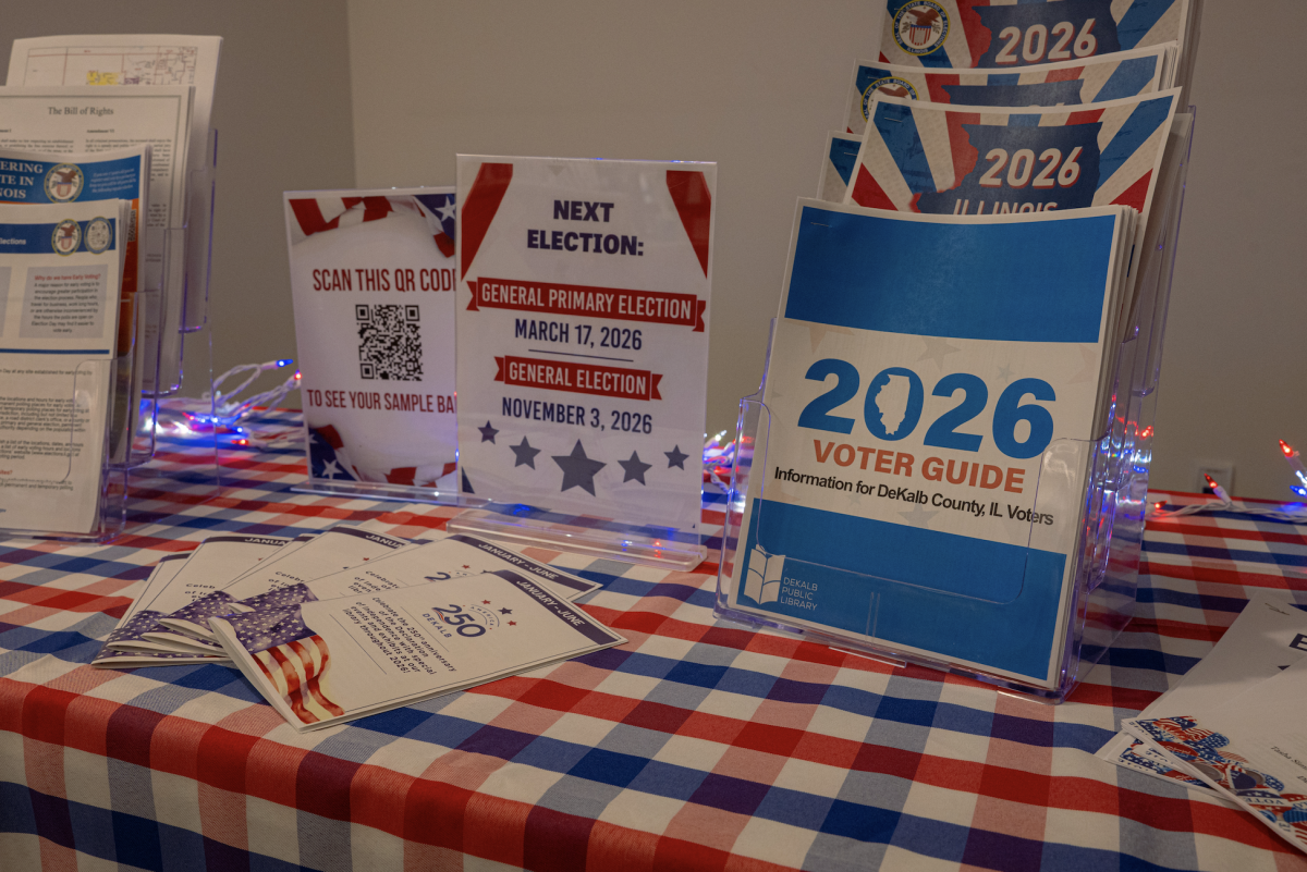 Information on the 2026 Primary in DeKalb County sits on a table in the DeKalb Public Library, 309 Oak St. In DeKalb County, U.S. citizens and residents older than 18 years can vote from 6 a.m. to 7 p.m. on Friday for the General Primary of Illinois. (Totus Tuus Keely | Northern Star)