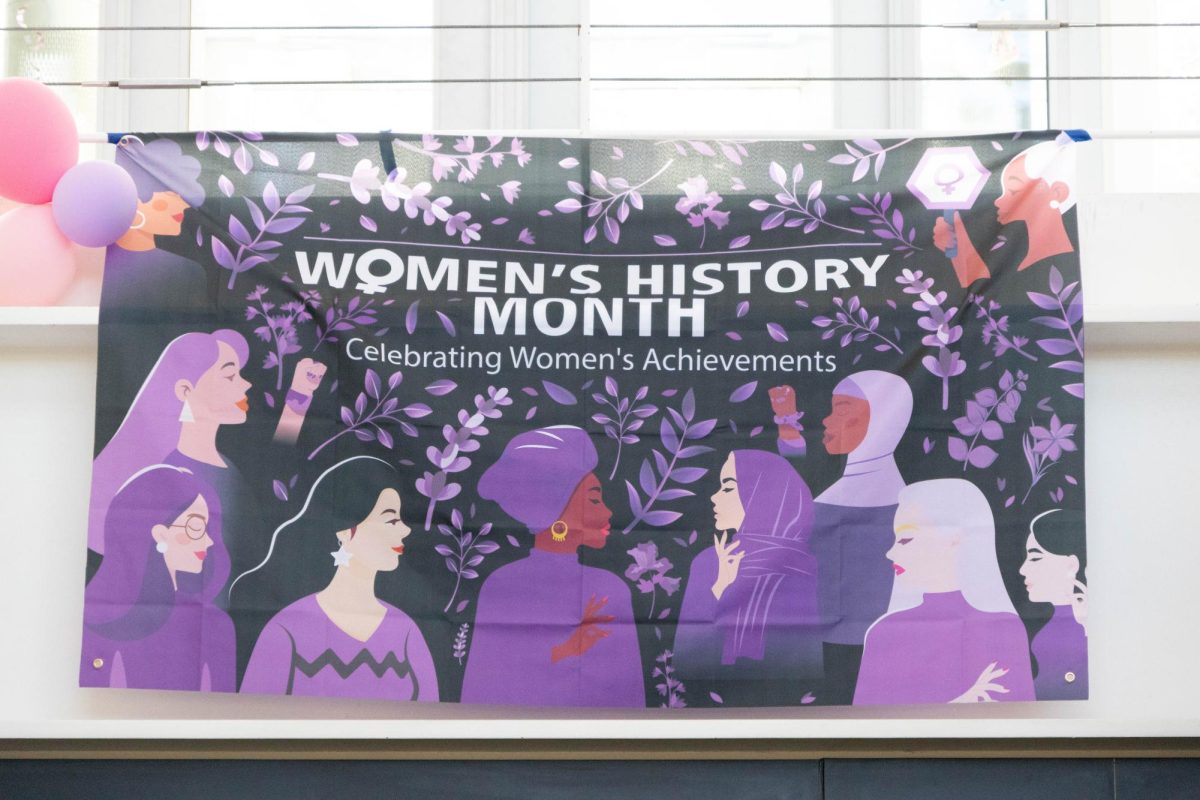 A tapestry reading “Women's History Month” hangs in the Engineering Building. President Lisa Freeman highlighted the importance of women’s leadership during Women’s History Month events on campus. (Sanaa Scott | Northern Star)