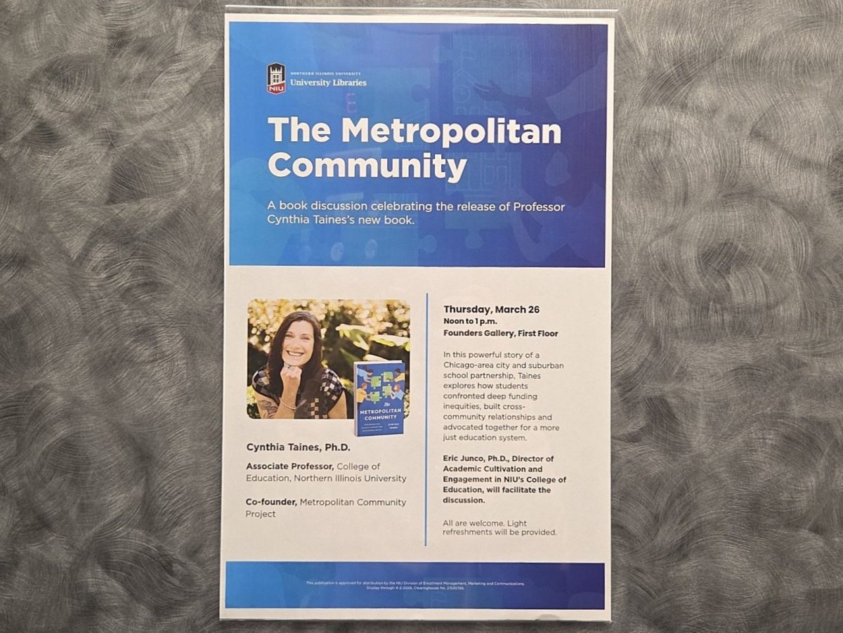 A flyer for Cynthia Taines, associate professor for foundations of education, discussion of her new book, “The Metropolitan Community” hangs in an elevator in Founders Memorial Library. Taines’s book talks about how students have pushed through school funding issues in Chicago and the suburbs by building a community. (Rachel Taye | Northern Star)