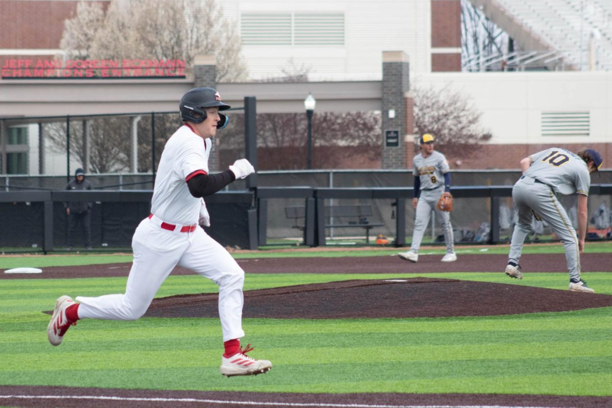 NIU baseball senior designated hitter Caden Robertson runs to first base against Kent State University on April 10 at Ralph McKinzie Field at Walt and Janice Owens Park. The Huskies fell to the University of Akron in a 4-3 loss on Sunday. (Northern Star file photo) 