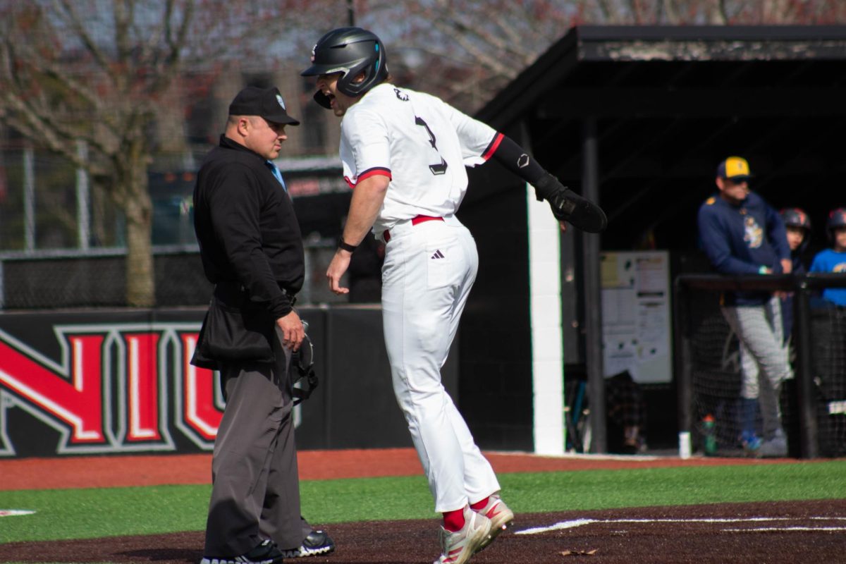 NIU baseball senior infielder Will Couchman celebrates after crossing home plate in the bottom of the second inning against Kent State University on April 10. Couchman hit a two-run home run in the fourth inning as the Huskies defeated the University of Illinois Chicago in a 9-8 win on Tuesday. (Northern Star file photo)