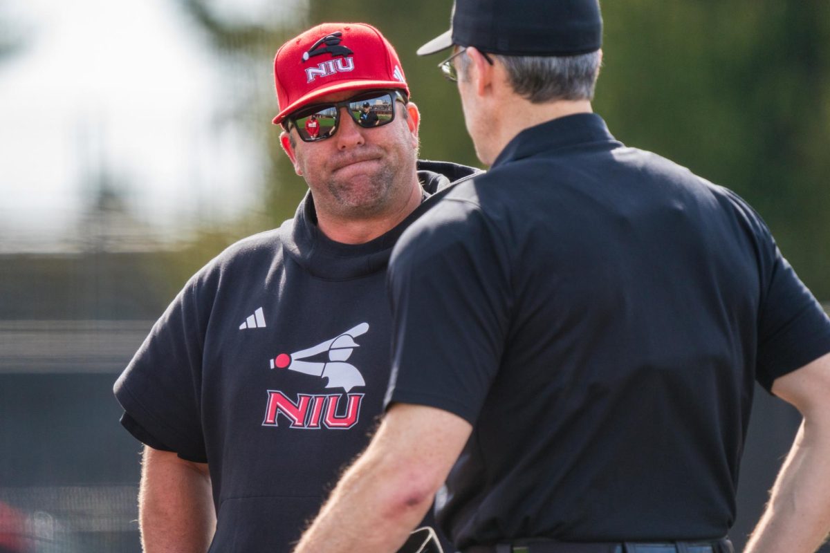 NIU baseball head coach Ryan Copeland attends the pre-game plate meeting against Miami University on March 20 at Ralph McKinzie Field at Walt and Janice Owens Park. NIU fell to Eastern Michigan University in a 9-7 loss to end the series on Sunday. (Northern Star file photo)