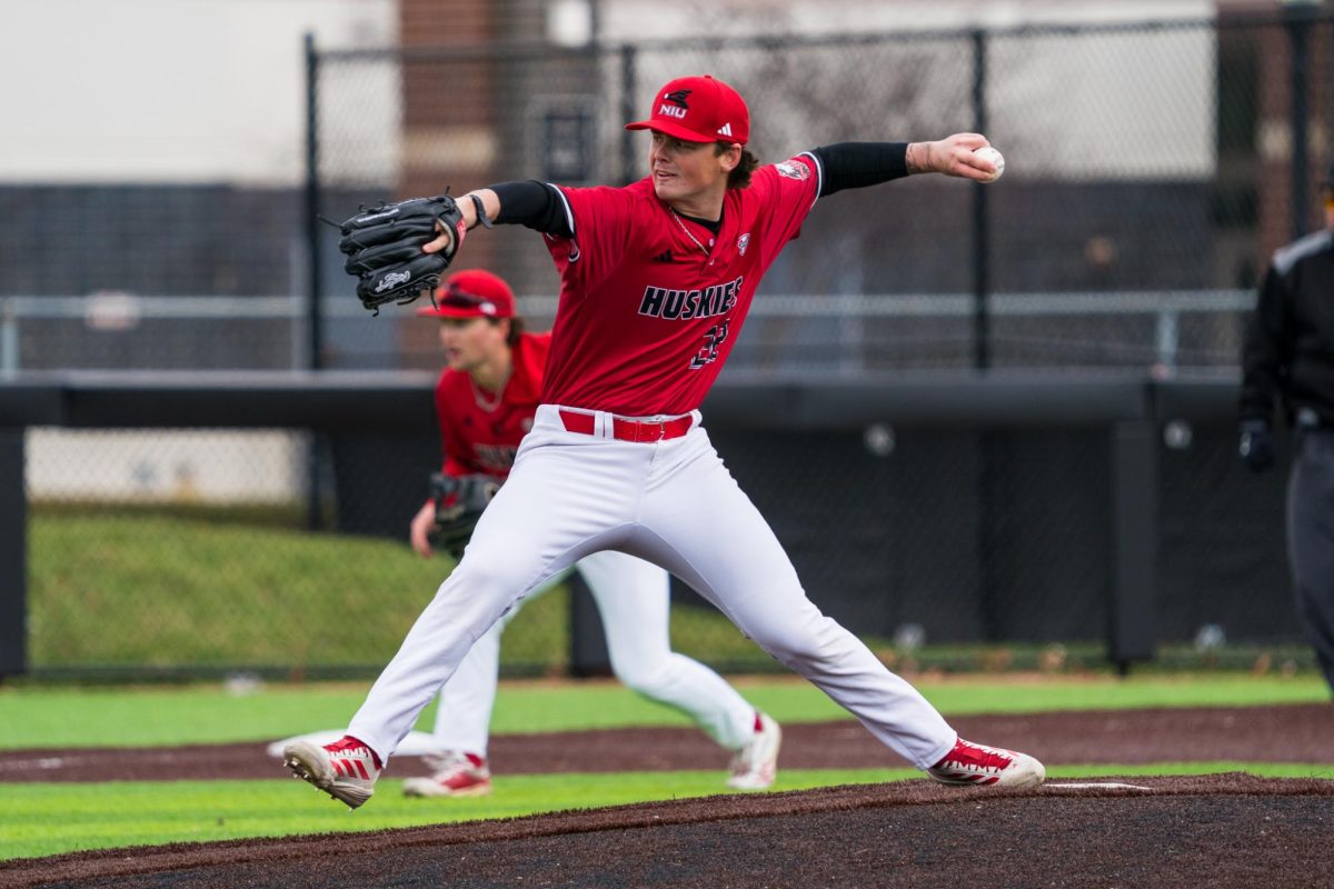 NIU baseball sophomore pitcher Carter Cox delivers a ball to Miami University junior outfielder Marcus Dierks on March 22. Cox went seven innings while holding Kent State University to two runs on Sunday as NIU took a 5-2 win against the Golden Flashes. (Northern Star file photo)