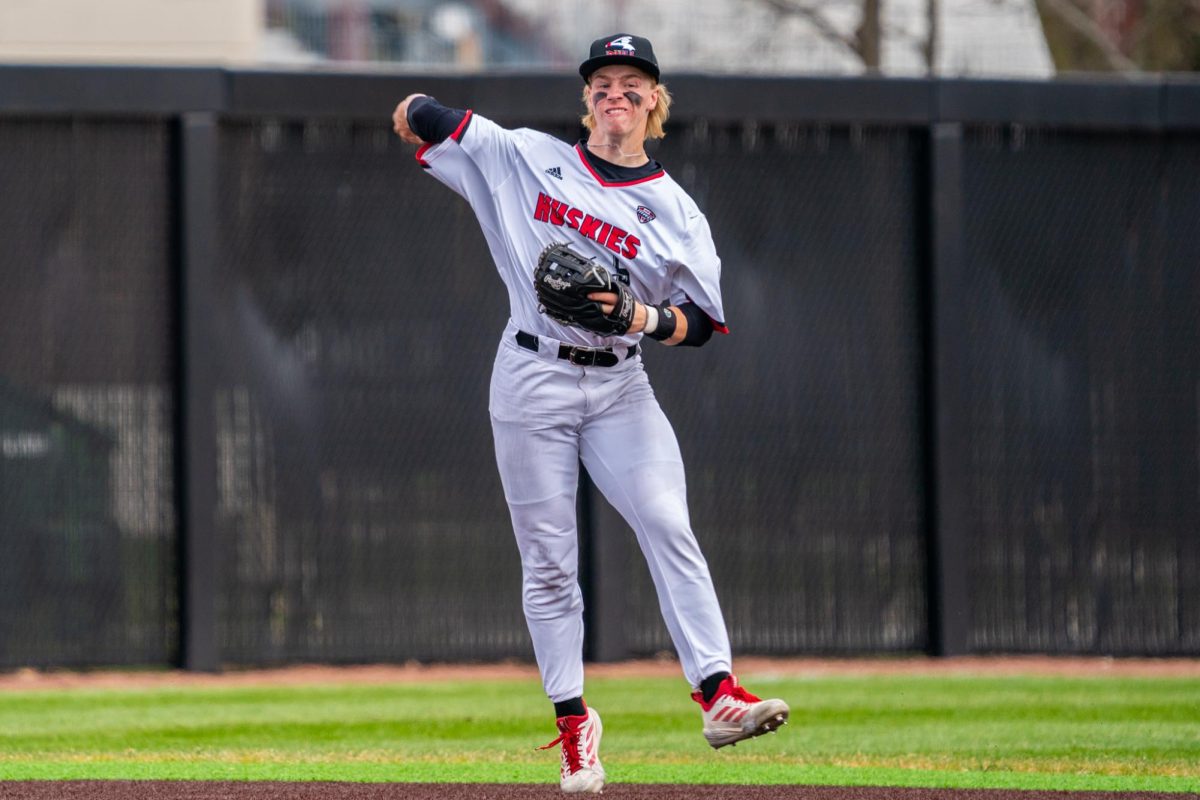 NIU baseball sophomore shortstop Nolan Sandee makes a leaping throw against Bowling Green State University on Sunday at Ralph McKinzie Field and Walt Janice Owens Park. Sandee recorded two runs batted in as the Huskies shutout the University of Massachusetts Amherst on Sunday. (Northern Star file photo)