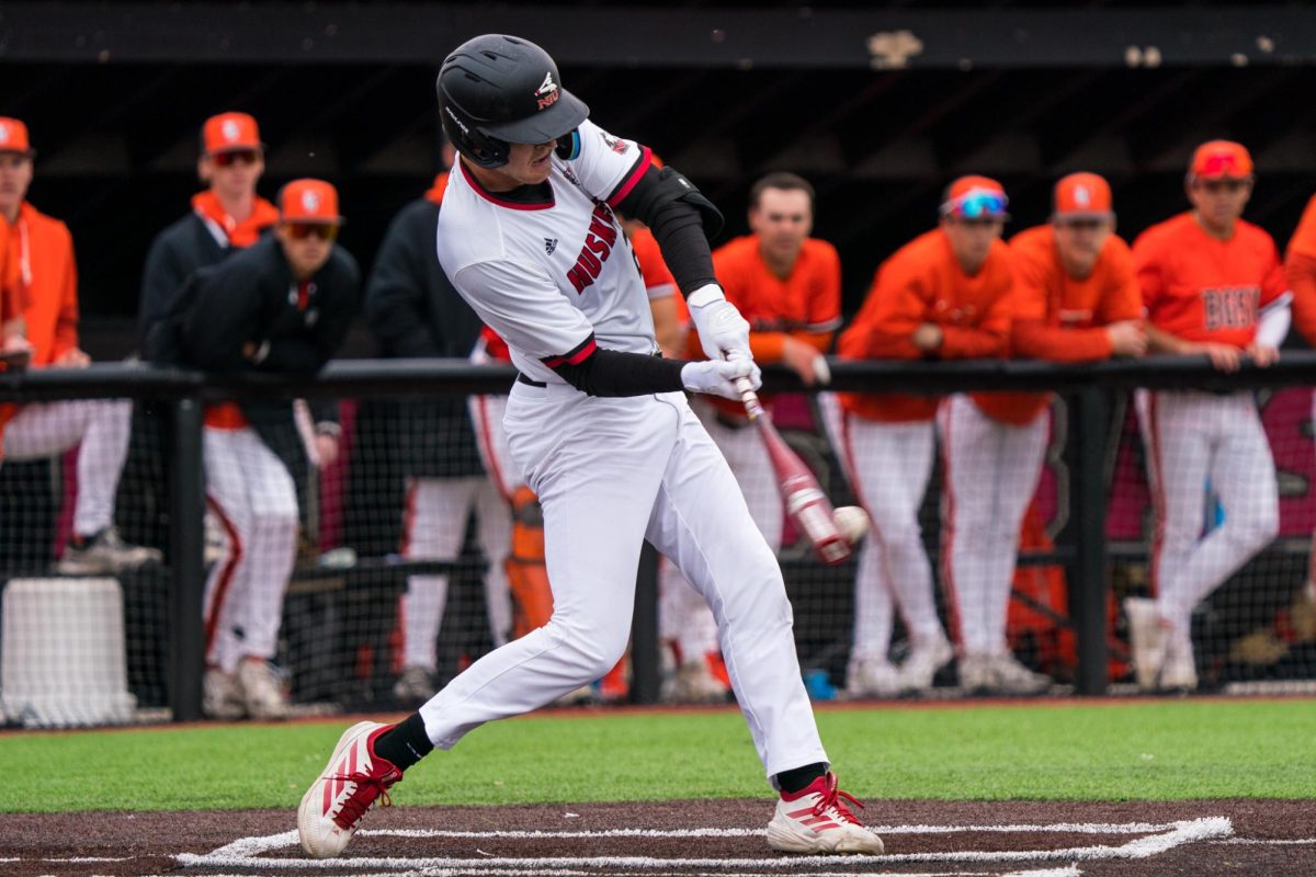 NIU senior outfielder Caden Robertson swings during an at-bat against Bowling Green State University on Sunday. Joining the Huskies in the offseason as a transfer, Roberston leads the team in home runs and runs batted in. (Eric McGill | Northern Star)