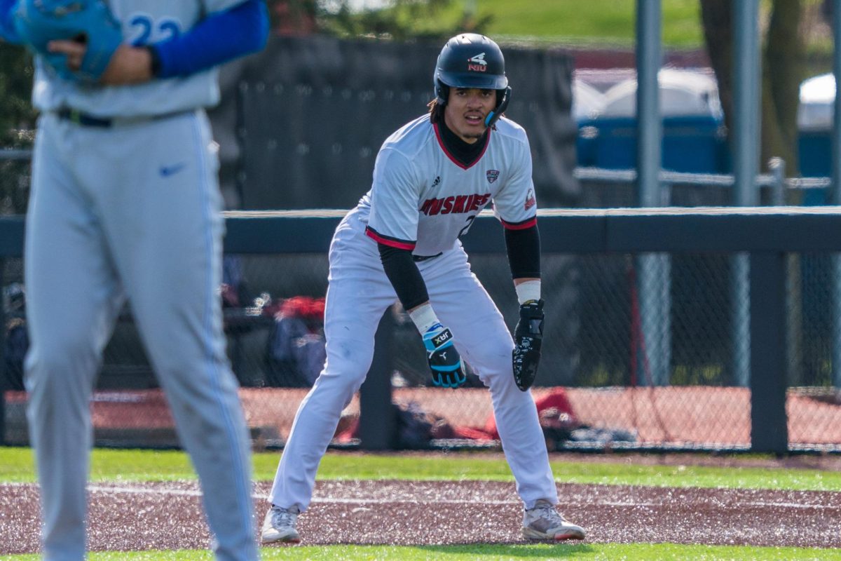 NIU baseball junior outfielder Marcus Romero watches the pitcher before a pick-off attempt against Eastern Illinois University on Tuesday at Ralph McKinzie Field at Walt and Janice Owens Park. Romero had three hits and a stolen base in the Huskies’ 11-9 loss, splitting their season series with the Panthers.  (Eric McGill | Northern Star)