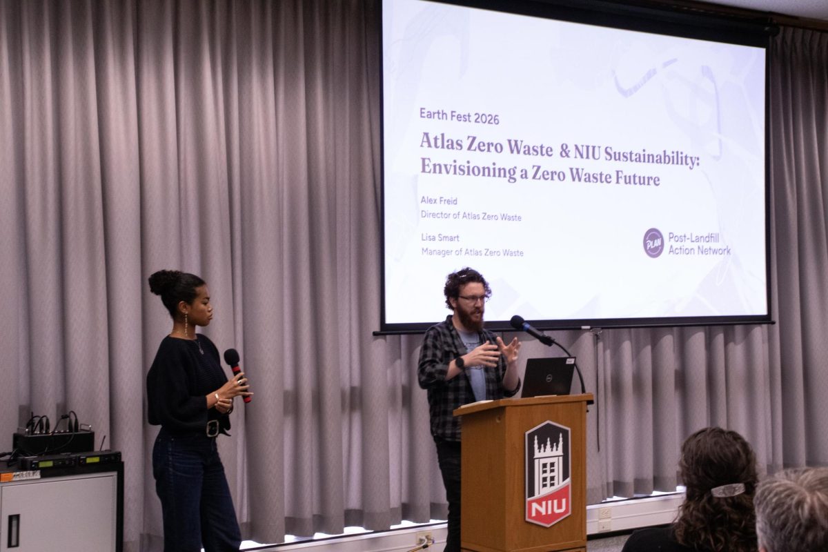 Keynote speakers Alex Fried, director of Atlas Zero Waste, and Lisa Smart, manager of Atlas Zero Waste, deliver their presentation Envisioning a Zero Waste Future describing their emerging relationship with NIU at Earth Fest. The event took place at from 11 a.m. to 3 p.m. Saturday at the Founders Memorial Library. (Roshay Grant | Northern Star)