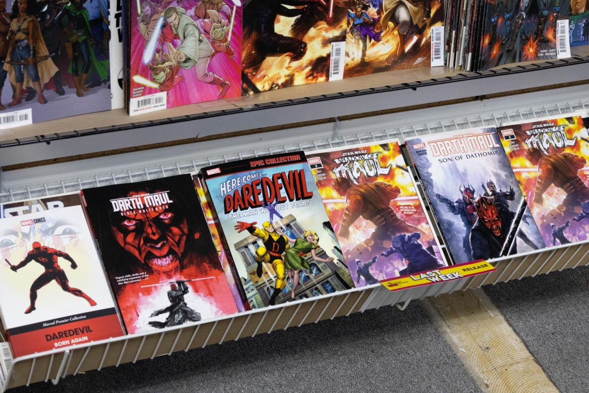 Graham Cracker Comics, 901 Lucinda Ave., displays a few of its Daredevil and Darth Maul comic books on Wednesday, in anticipation of the release of TV shows “Maul: Shadow Lord” and “Daredevil: Born Again”. Lifestyle Writer Micah Ragland compiled a list of comic book based TV shows with upcoming episode releases. (Jayce Pendergrass | Northern Star) 