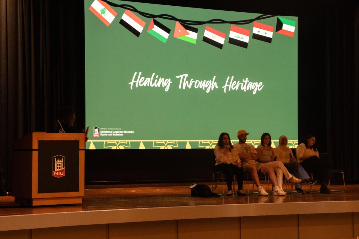 Student panelists sit on stage at the Healing Through Heritage: Honoring Arab American Heritage Month event. The event was hosted from 5 p.m. to 8 p.m. Wednesday in the Holmes Student Center, Duke Ellington Ballroom. (Roshay Grant | Northern Star)