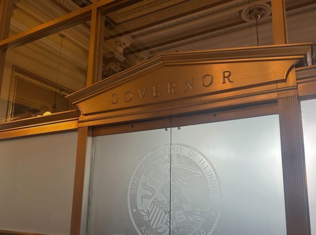 A sign that reads “Governor” hangs over Illinois Governor JB Pritzker’s office. On March 27, a coalition of Illinois public universities released a joint statement calling for the passing of the Adequate and Equitable Funding Formula. (Diego Martinez | Northern Star)