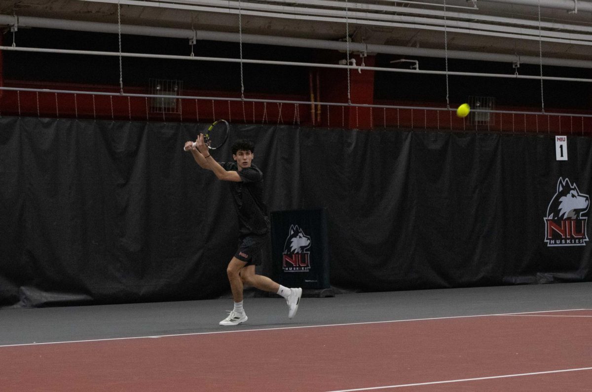 NIU men’s tennis senior Iker Gaztambide Arrastia returns a volley during his singles match against the University at Buffalo on March 19. The Huskies fell in a 5-2 match in Buffalo, New York, on Thursday. (Northern Star file photo) 