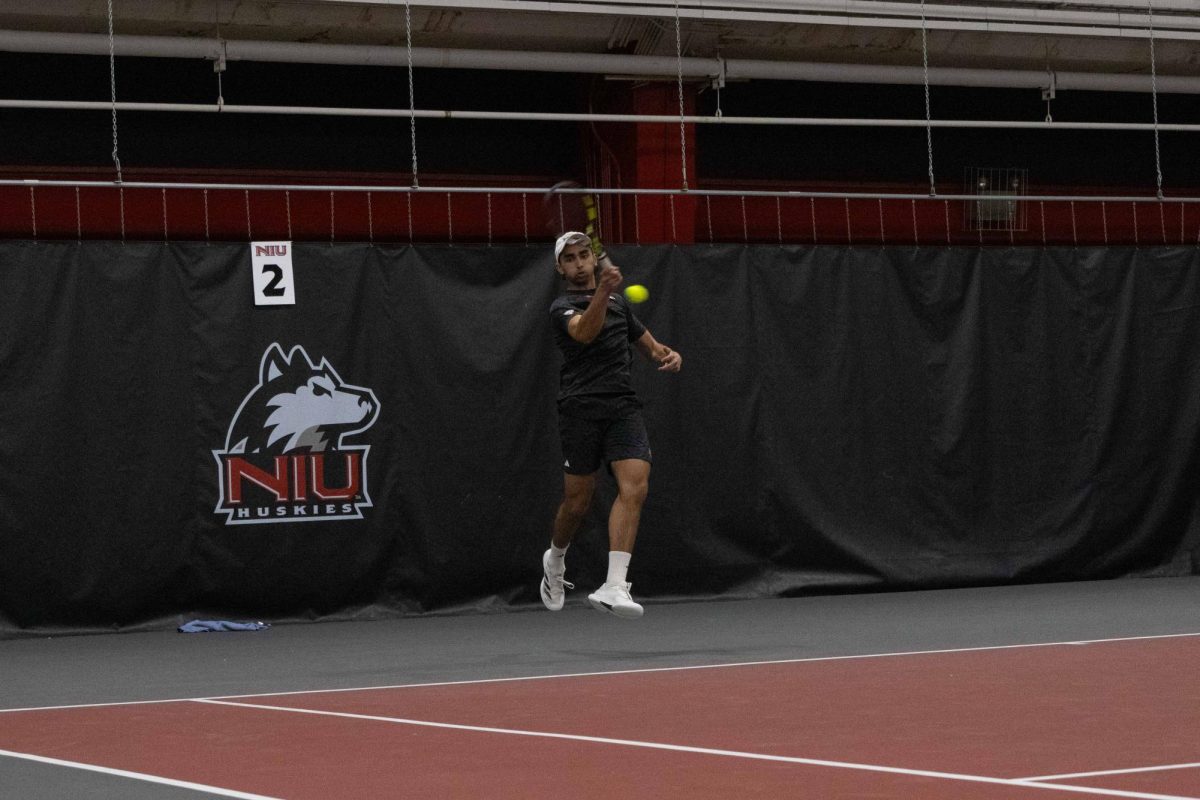 NIU men’s tennis sophomore Pratyaksh LNU volleys back to University at Buffalo senior Emiliano Jorquera during their singles match on March 19.  NIU advanced to the Mid-American Conference championship match with a 4-3 win over Western Michigan University on Saturday. (Northern Star file photo)