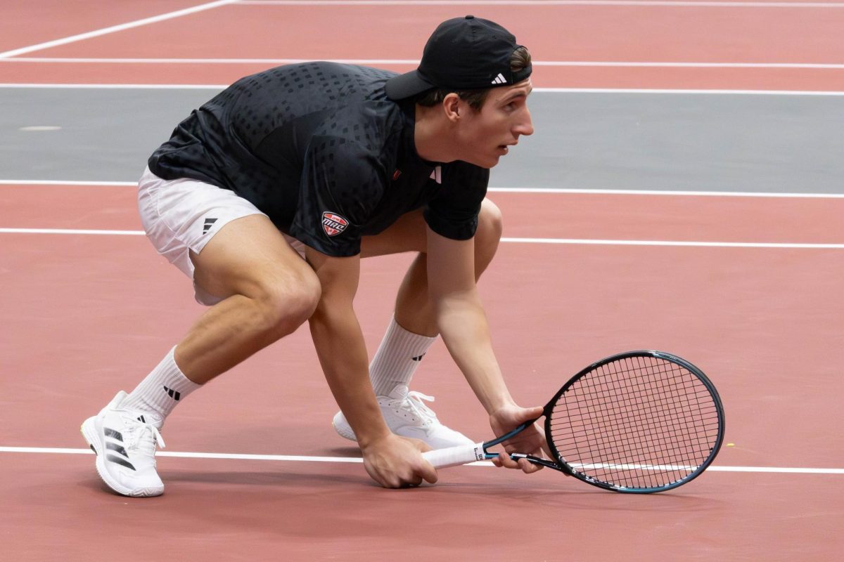 
NIU men’s tennis sophomore Nikola Puntaric ducks close to the ground during his doubles match with senior Iker Gaztambide Arrastia against the University of Illinois Chicago on March 28. Puntaric was named the Mid-American Conference Player of the Week after a 2-0 weekend at No. 1 singles. (Northern Star file photo)