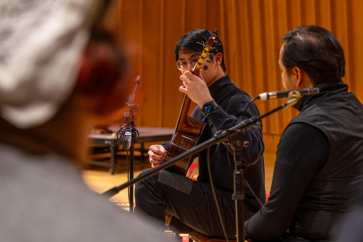 Guest performer Rujikorn Trikham performs “Kamen Sai Yok/Kun Know Kin Klauy” on the classical guitar on Tuesday in the Music Building, Boutell Memorial Concert Hall. Trikham performed alongside Thai Music Ensemble advisor Chamni Sripraram on the khlui. (Eric McGill | Northern Star)