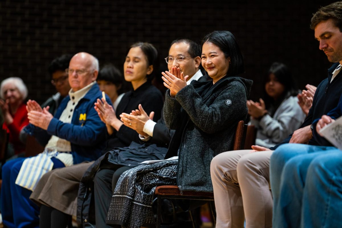 Audience members applaud at the conclusion of “Khae-Mon-Bang-Kuhn-Prom” on Tuesday in the Music Building, Boutell Memorial Concert Hall. The second event of the World Music Festival  on Friday will start at 8 p.m. in the Recital Hall. (Eric McGill | Northern Star)