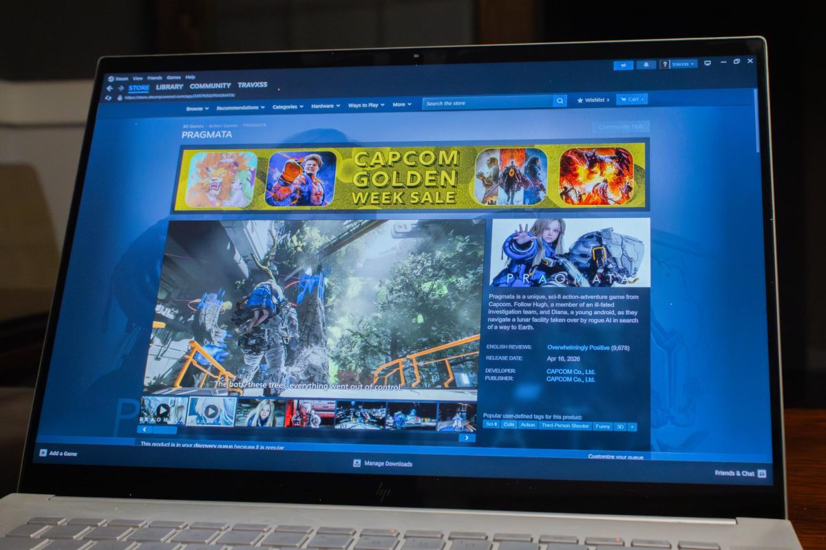 A laptop displays the Steam page for “Pragmata.” “Pragmata” is a science fiction action adventure video game focusing on a spacefarer’s relationship with an android companion. (Ethan Rodriguez | Northern Star)