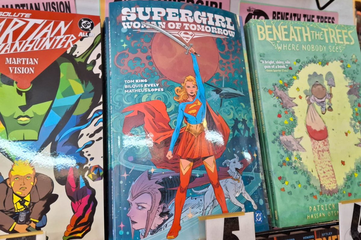 The comic “Supergirl: Women of Tomorrow,” written by Tom King with art by Bilquis Evely and colorist Matheus Lopes, sits at number five on the top 10 best sellers shelf at Graham Cracker Comics, 901 Lucinda Ave. Lifestyle Writer Micah Ragland analyzes how the trailer relates to the comics. (Sanaa Scott | Northern Star)